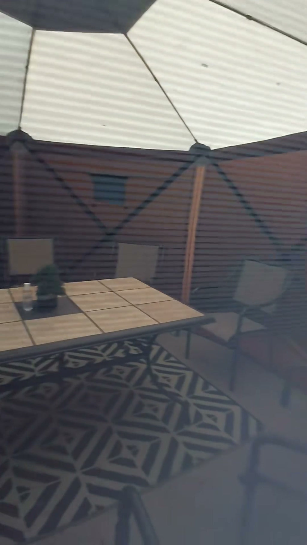 Removable privacy and wind panels fitted to the screen gazebo